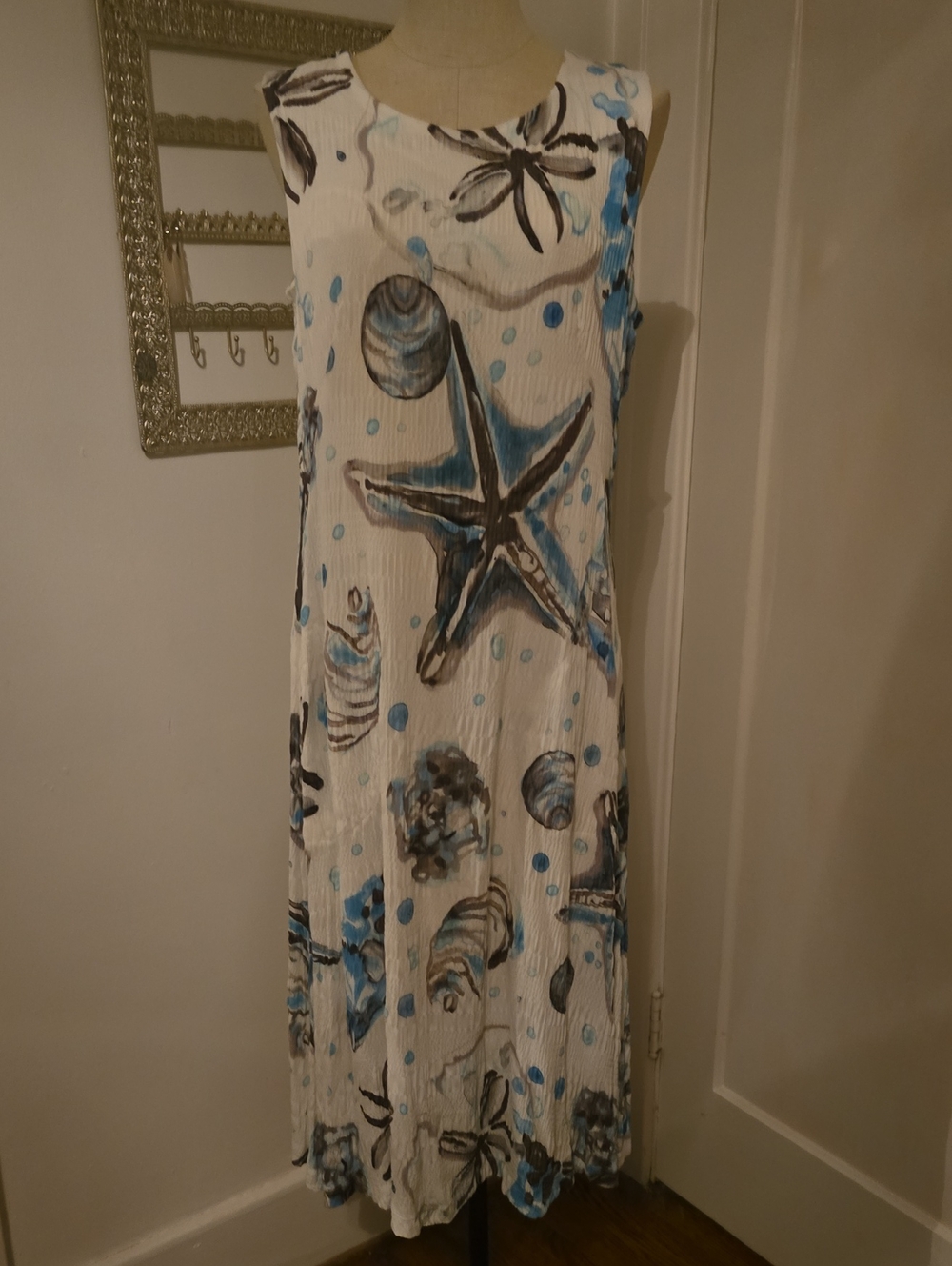 Boutique Sleeveless White Midi Dress with Blue & Brown Seashell Print